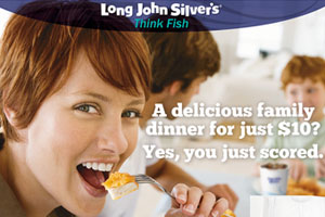 Long John Silver's print ad: A family of four enjoying a fried fish dinner.